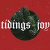 6816 - Tiding Of Joy - HD Title Slide Modern Christmas church media design with "Tidings of Joy" text over circular evergreen photo on red background with snow effects and gold accents
