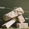 7593 Upon This Rock HD Title Slide "Stacked stones symbolize faith, stability, and the foundation of Christ, highlighting a study of the book of Matthew."