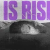 7908 he is risen hd title slide Empty tomb with a large stone rolled away, overlaid with bold text proclaiming "HE IS RISEN!" in vibrant purple.