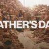 8102 fathers day hd title slide Sunlight breaks over rugged mountains, with "Father's Day" boldly displayed, symbolizing strength and guidance in faith.