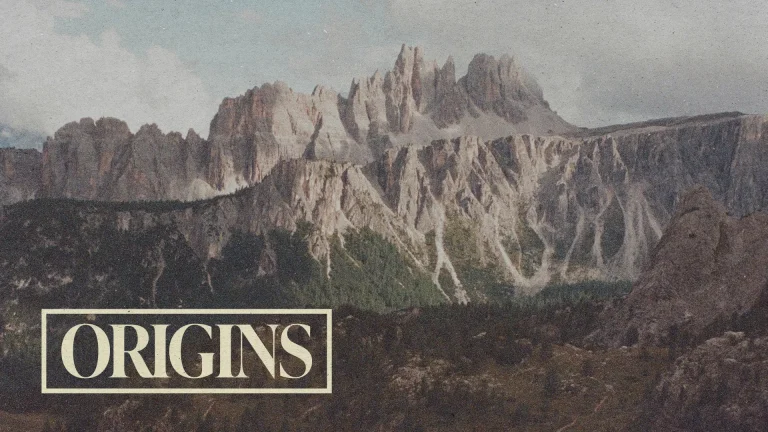 Majestic mountains symbolize creation and faith, with "ORIGINS" text highlighting spiritual beginnings and community.