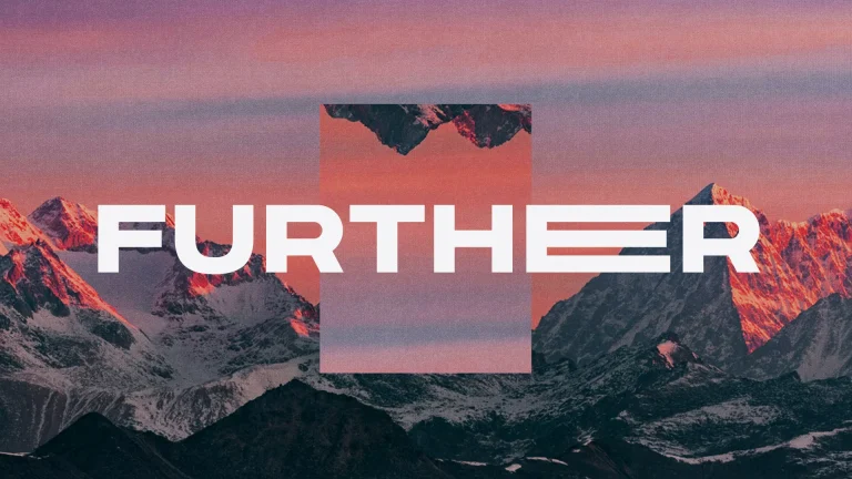 Mountains at sunset with the word "FURTHER," symbolizing growth in faith and spiritual journey.