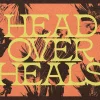 8551 head over heals hd title slide Bold text reads "Head Over Heals" against a textured background with floral patterns, symbolizing love and faith.