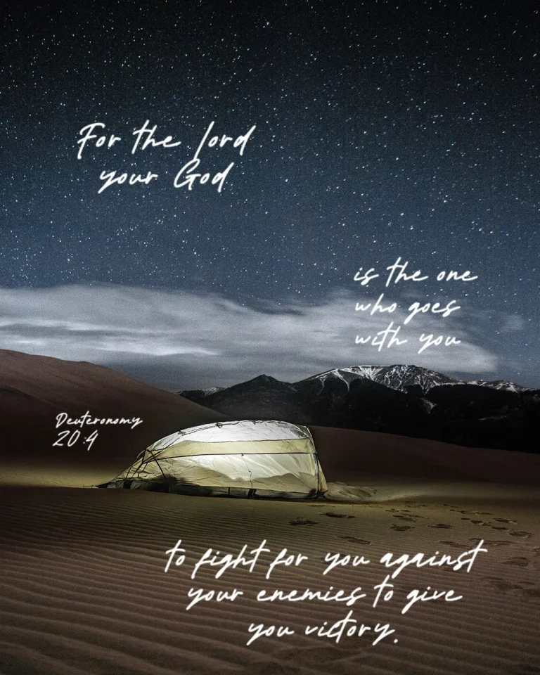 Breathtaking church media graphic featuring Deuteronomy 20:4 "For the Lord your God is the one who goes with you to fight for you against your enemies to give you victory" overlaid on a stunning desert night scene with illuminated tent and starry sky.
