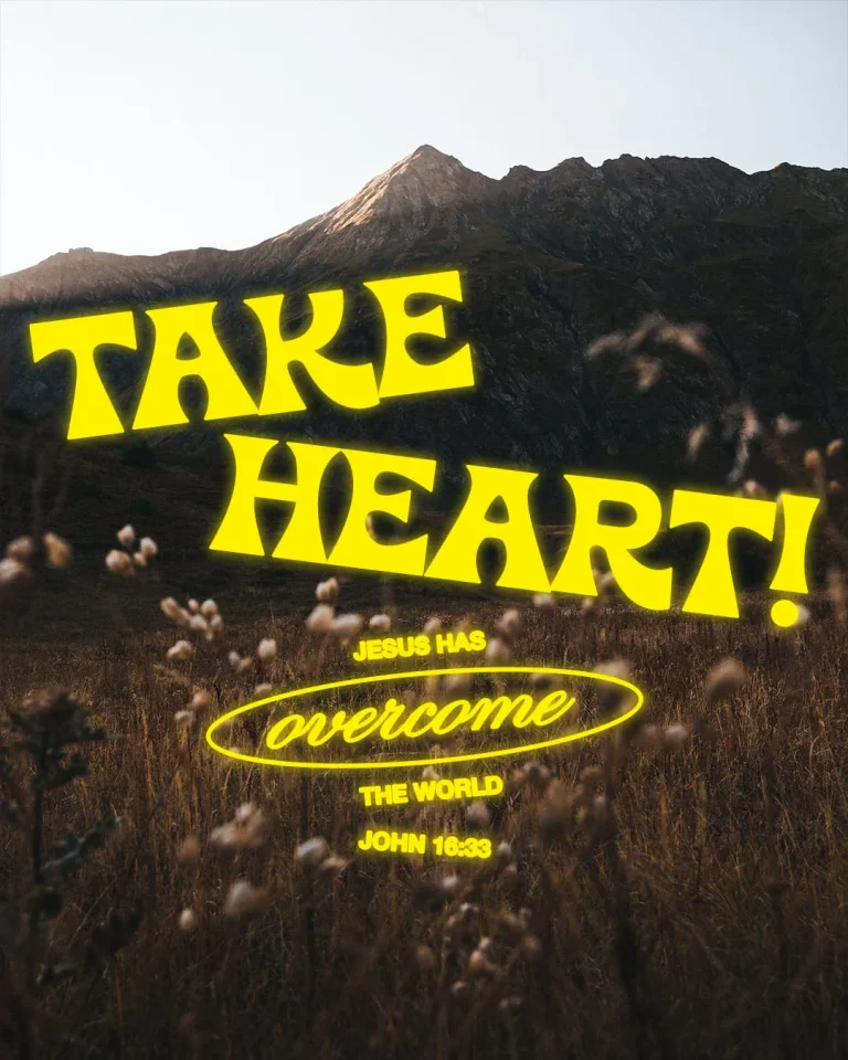 Experimental church media design featuring dramatic mountain landscape with vibrant yellow typography reading "TAKE HEART! JESUS HAS overcome THE WORLD" with John 16:33 reference