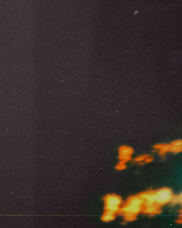 Abstract light patterns symbolizing spiritual awakening and divine presence in a dark, contemplative space.