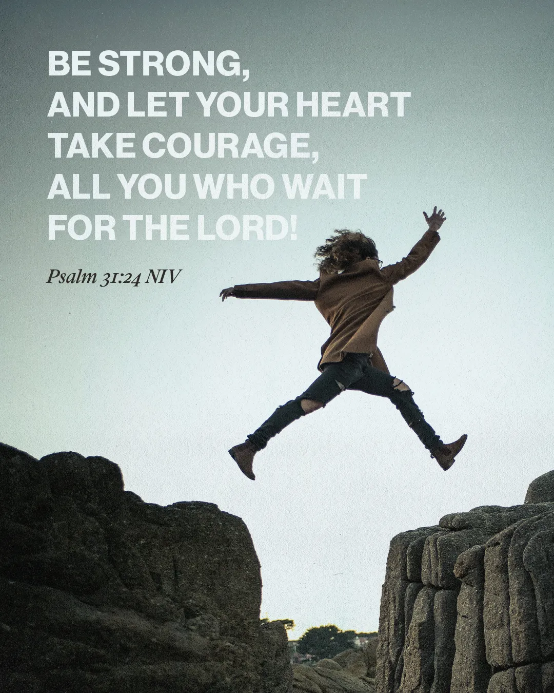 Person leaps between rocks, symbolizing faith and courage; Psalm 31:24 encourages strength and waiting for the Lord.