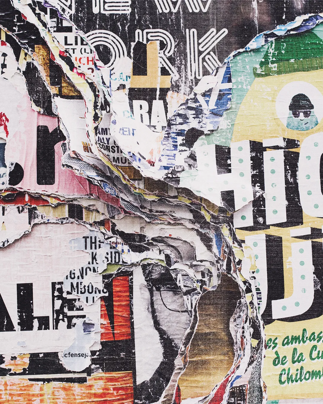 Torn layered posters symbolizing community diversity and spiritual renewal.