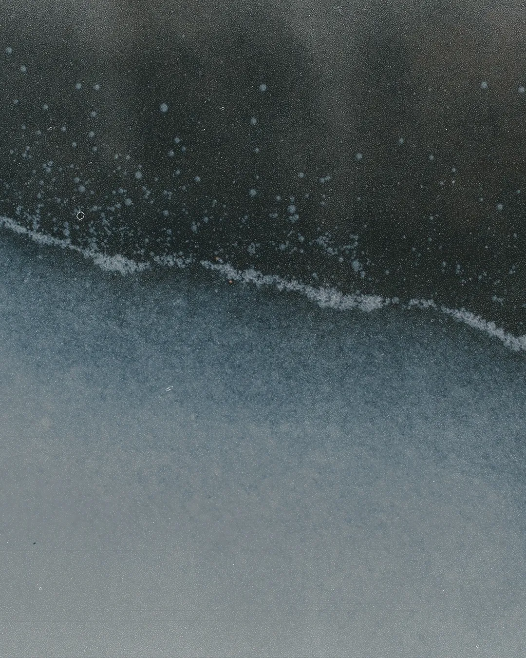 Abstract waves of light and dark, symbolizing spiritual reflection and divine mystery.