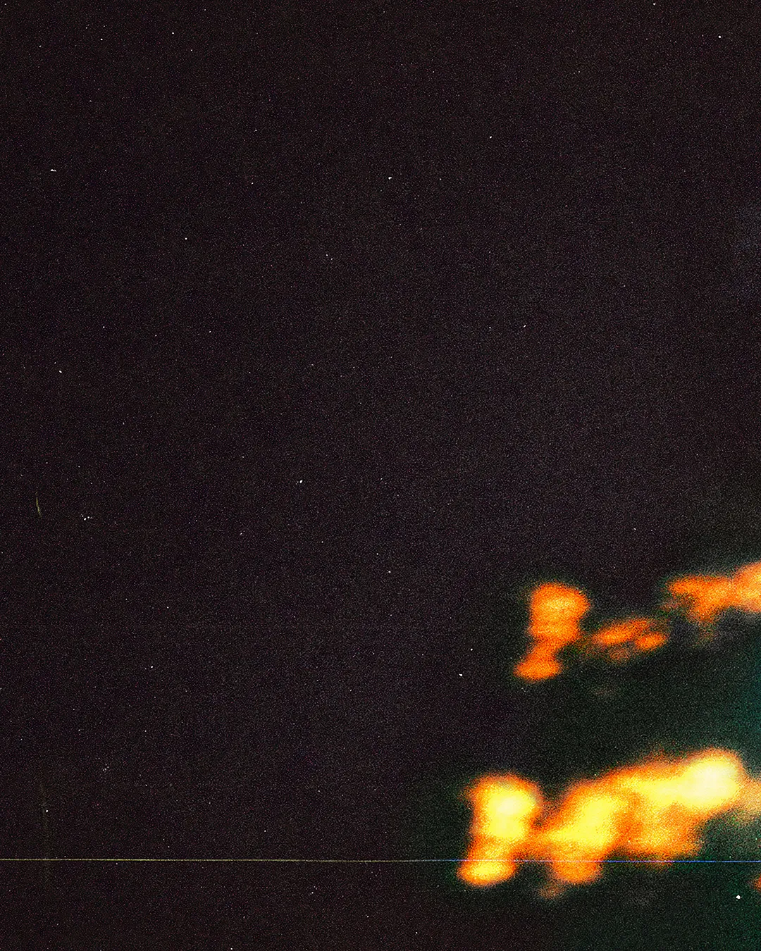 Abstract glowing lights evoke spiritual warmth and divine presence against a dark backdrop, symbolizing hope and faith.