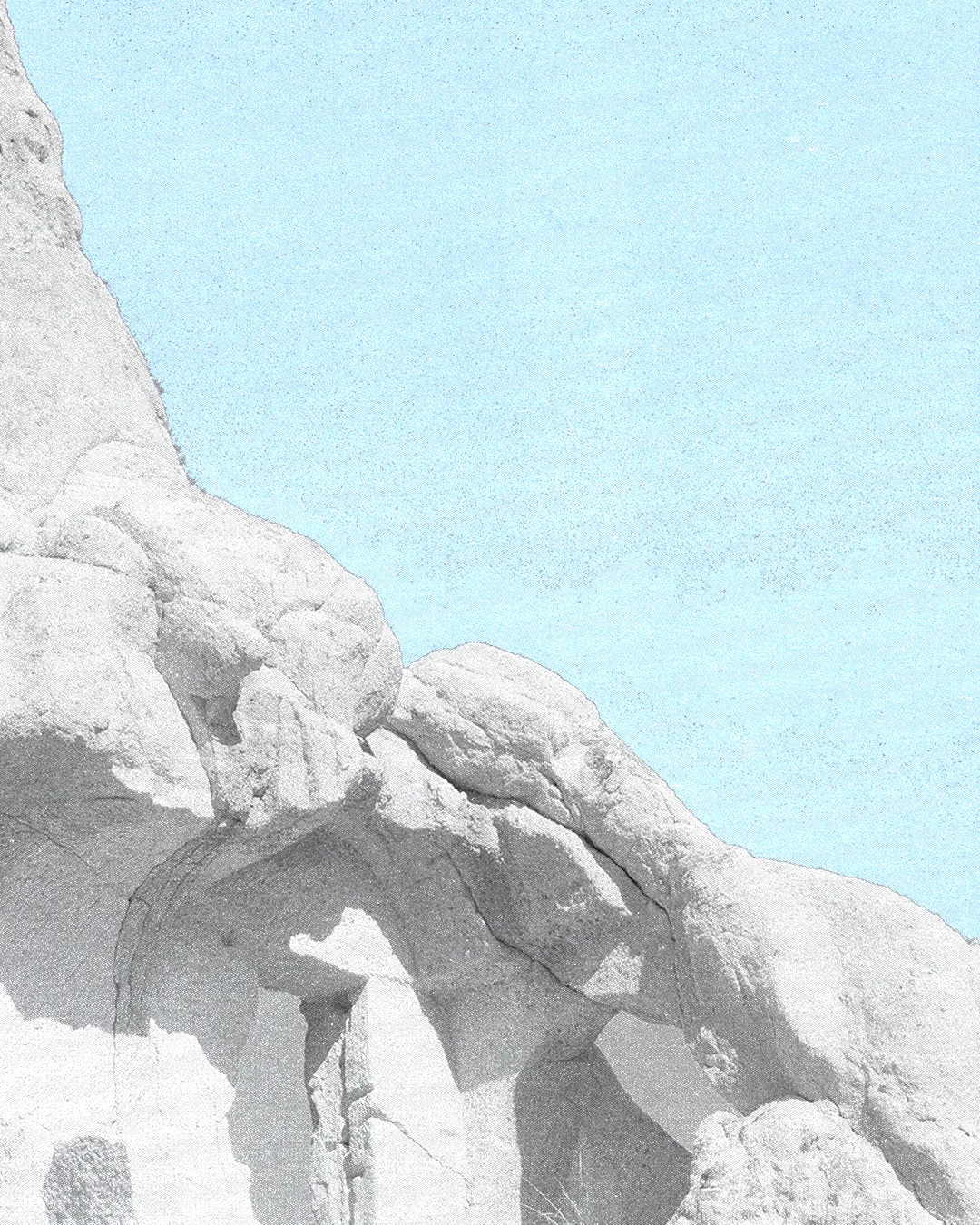 Rocky landscape with a serene blue sky, symbolizing strength and faith in God's creation. Ideal for worship themes.