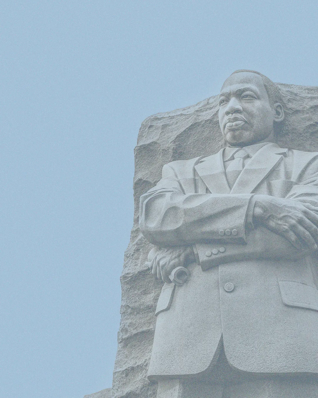Statue of Martin Luther King Jr. symbolizes faith, justice, and the pursuit of equality in the spirit of community and service.