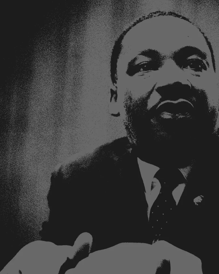 A thoughtful leader embodies faith and justice, inspiring community through powerful words and actions.