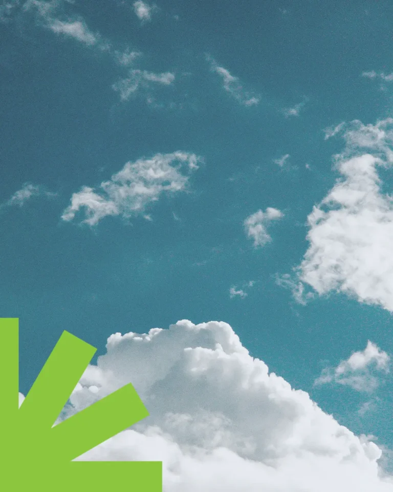 Bright blue sky with fluffy clouds, symbolizing hope and faith, complemented by a vibrant green graphic element.