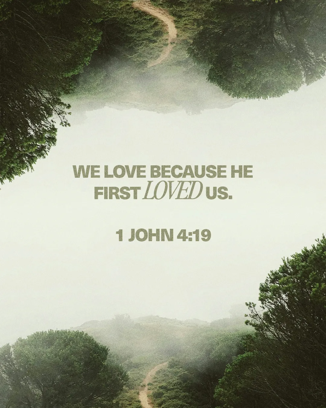 Serene landscape with a winding path, featuring the scripture "We love because He first loved us" - 1 John 4:19.