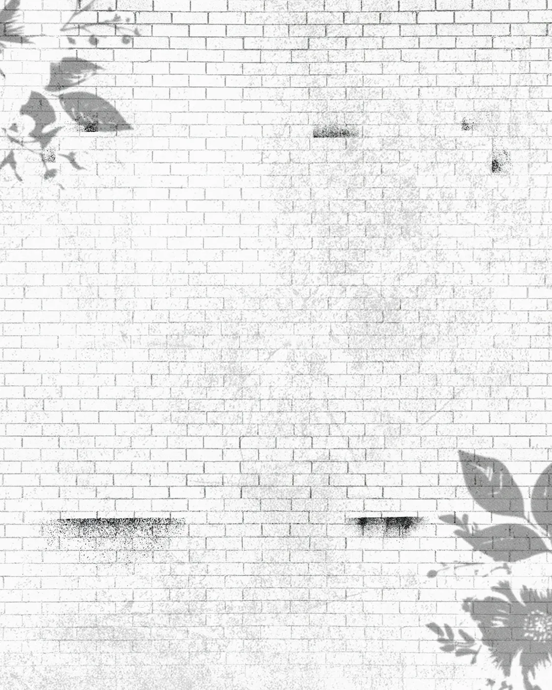 Textured white brick wall adorned with subtle floral patterns, symbolizing growth and community in faith.