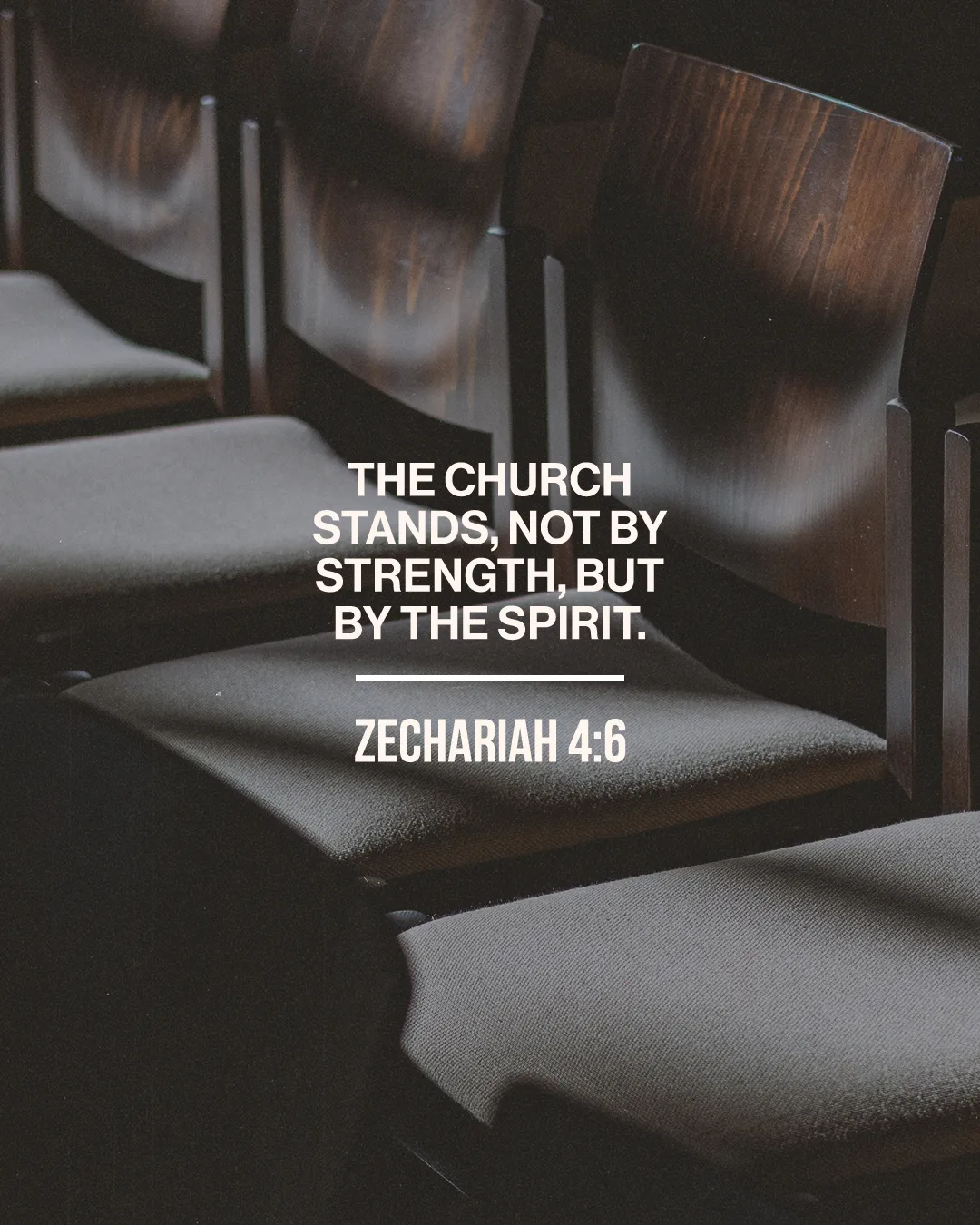 Empty church chairs with a biblical quote emphasizing faith and the Spirit's strength. Zechariah 4:6.
