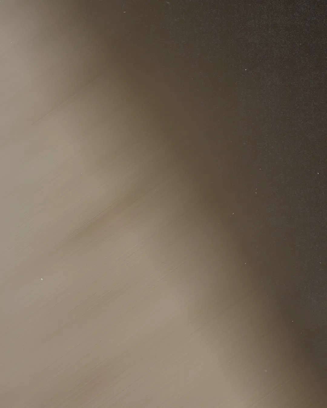 Soft gradients of brown and black evoke a sense of calm, reflecting spiritual depth and community unity.