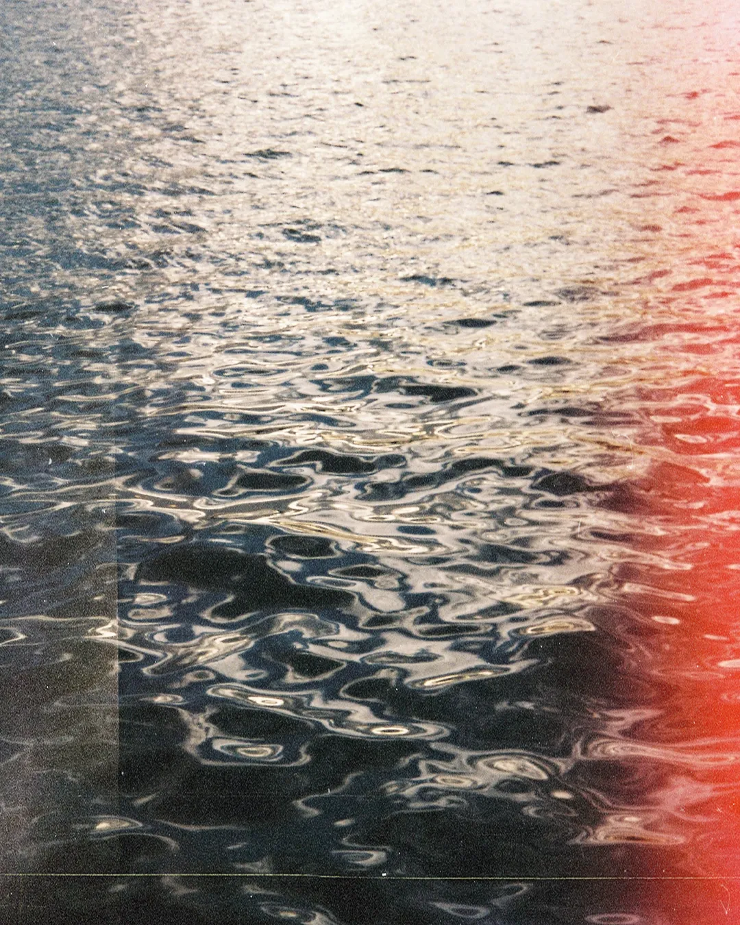 Gentle ripples on water reflect light, symbolizing peace, renewal, and the presence of the Holy Spirit in worship.